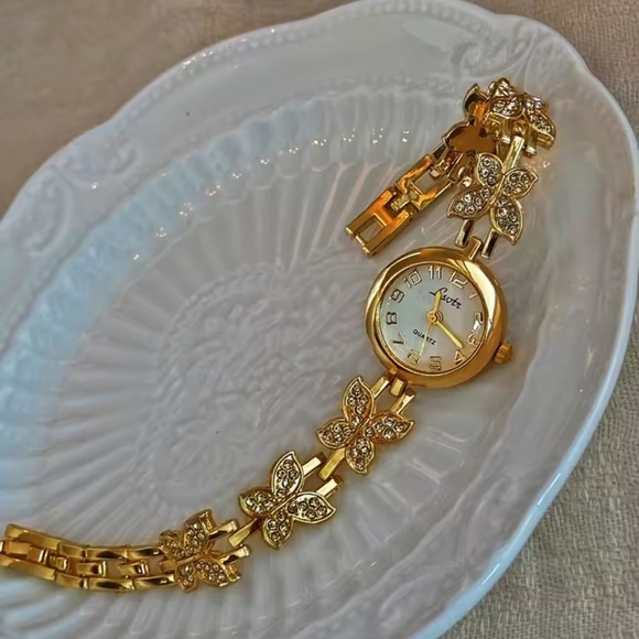 Anthropologie Accessories - Vintage Gold Butterfly Crystal Bracelet Watch